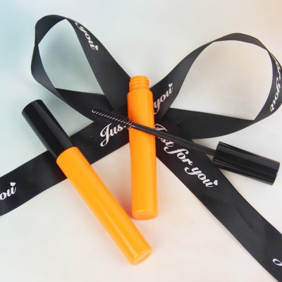 Trendy orange round empty empty packing eyelash cream bottle mascara tube with brushes