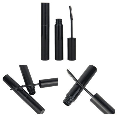 Unique black round plastic cosmetic packaging mascara containers tube with brush